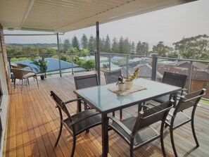 Outdoor dining - Black Head Beach holiday home, views.
 (Black Head)