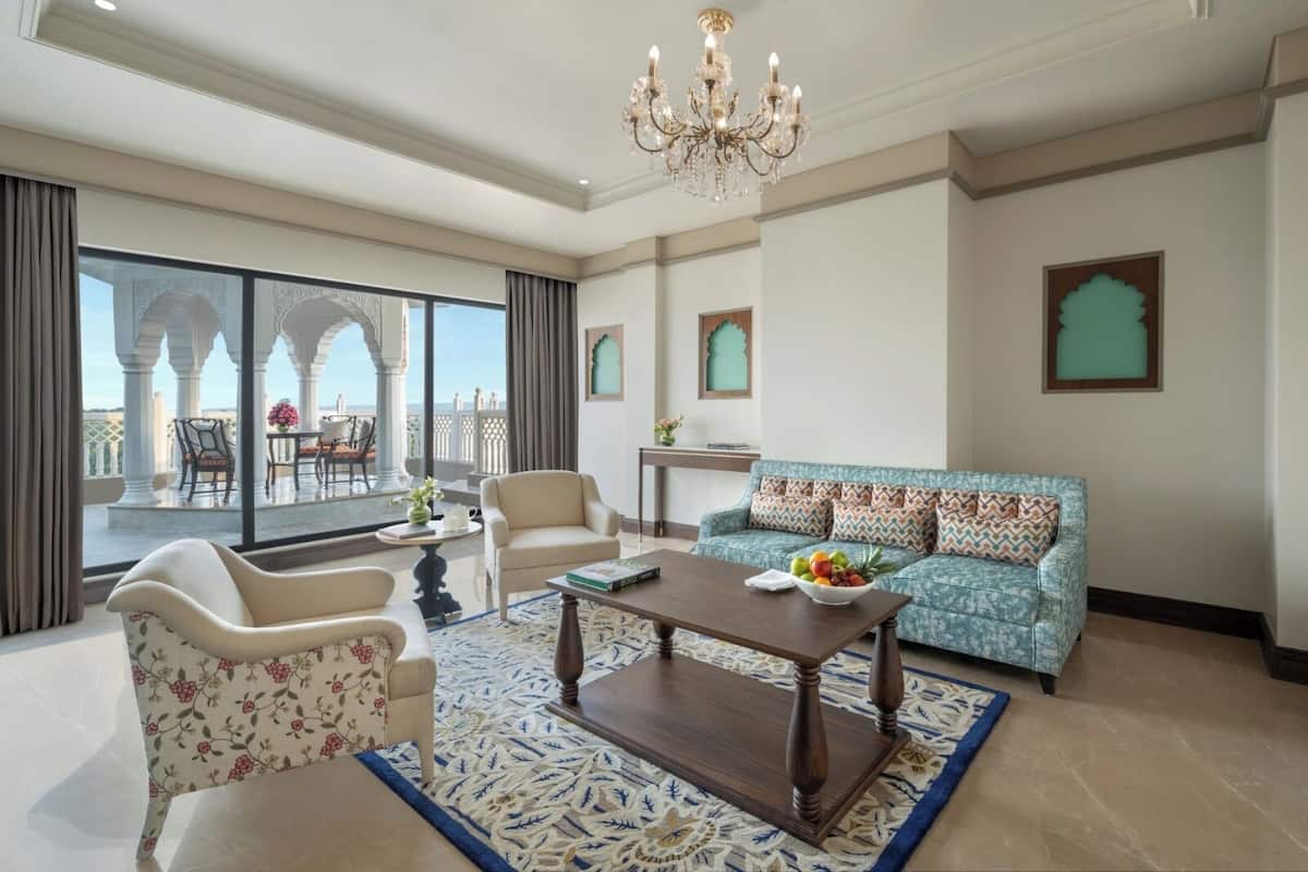 Suite, 1 King Bed (Luxury Suite) | Living area | 42-inch LED TV with satellite channels, fireplace