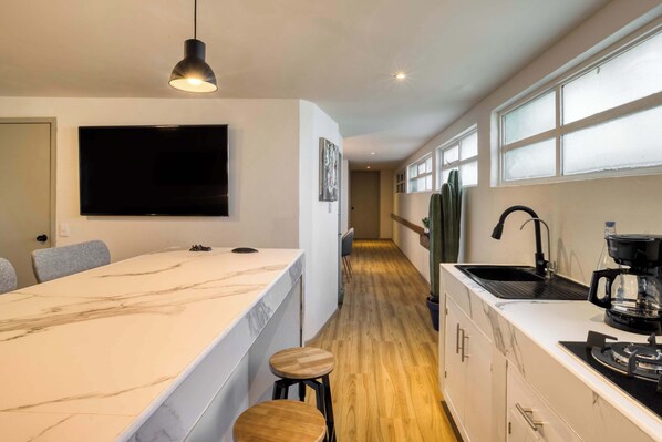 Fridge, microwave, cookware/dishes/utensils