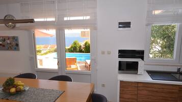 Villa (Three Bedroom Villa with Pool) | Private kitchen | Fridge