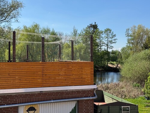 Holiday Home 'M Und S - Landidyll Am Weiher' with Lake View, Private Terrace and Wi-Fi