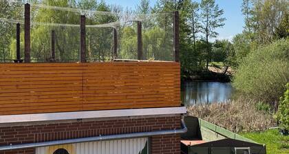 Holiday Home 'M Und S - Landidyll Am Weiher' with Lake View, Private Terrace and Wi-Fi