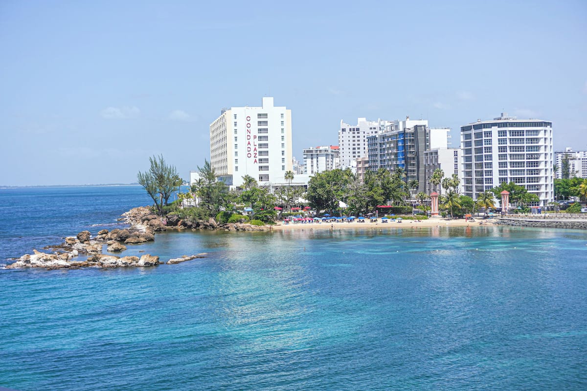 Exclusive Studio Suite, Balcony, Lagoon View | Desk, laptop workspace, blackout curtains, iron/ironing board