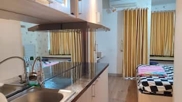 Deluxe tweepersoonskamer | Een bureau, gratis wifi, beddengoed