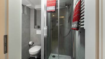 Shower, free toiletries, hair dryer, towels