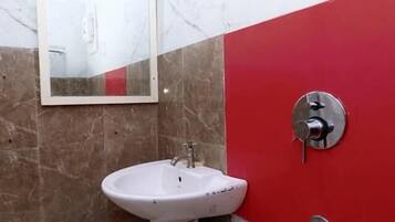 Deluxe Room, Balcony, City View | Bathroom | Shower, towels, soap, toilet paper