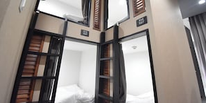 Basic Quadruple Room, Mixed Dorm | 1 bedroom, in-room safe, free WiFi, bed sheets