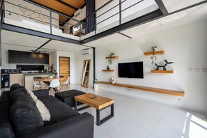City Villa | Living room | Flat-screen TV - Astaga Loft Unit 4 by Betterplace (Canggu)