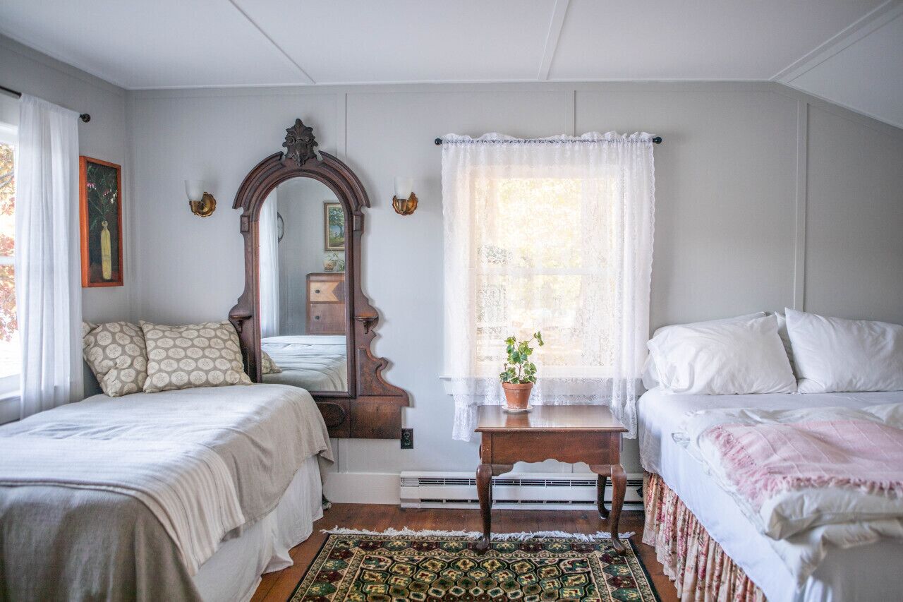Second bedroom with a queen-sized and twin-sized beds