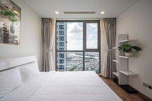 Deluxe Apartment, 3 Bedrooms, Balcony, River View | Premium bedding, memory foam beds, individually decorated - YoungC Apartment Landmark (Ho Chi Minh City)