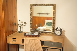 1 bedroom, desk, iron/ironing board, travel crib