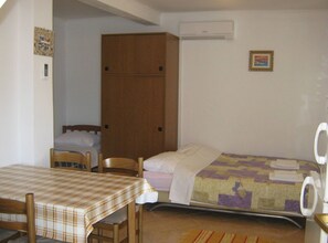 Studio (Studio Apartment with Terrace and Sea) | 3 bedrooms, cribs/infant beds, free WiFi