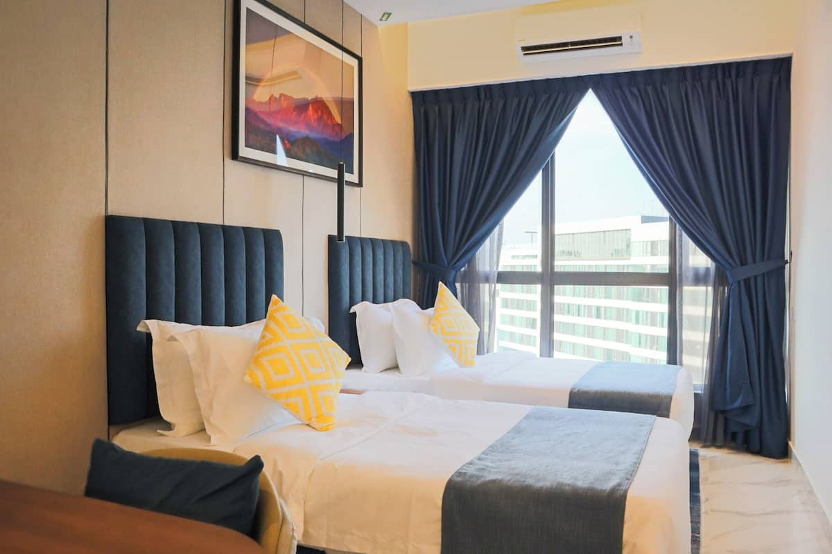 ห้องคอมฟอร์ทสวีท, 2 ห้องนอน, วิวเมือง, ริมทะ เล | เครื่องนอนระดับพรีเมียม, มินิบาร์, โต๊ะทำงาน, ผ้าม่านกันแสง