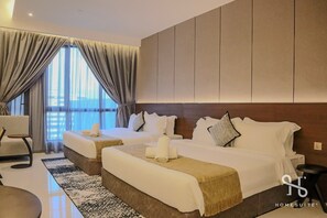Suite estudio Deluxe, para no fumadores, cocineta | Ropa de cama de alta calidad, minibar y decoración personalizada 