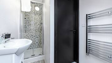 Shower, towels, soap, shampoo