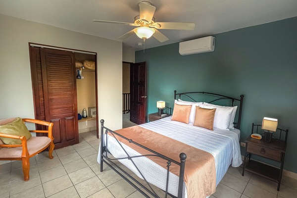 Generous-sized closet designed for easy organization.