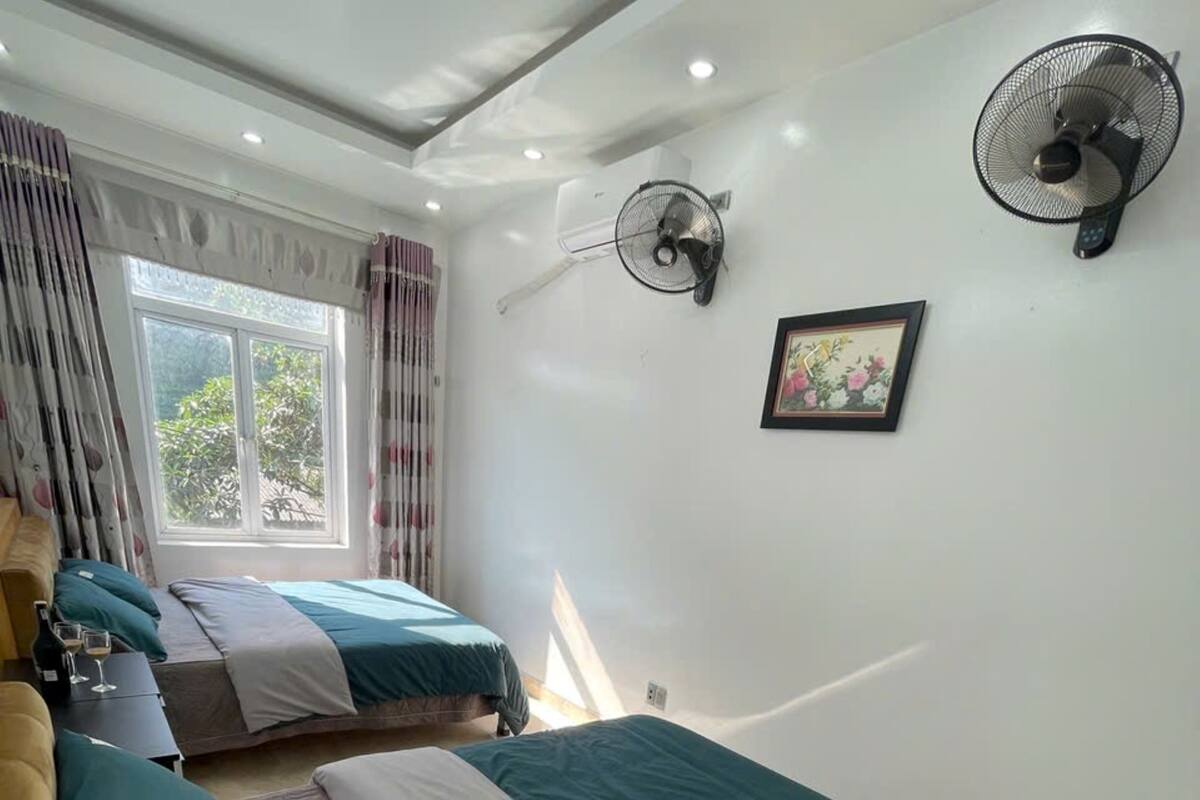 Standard Room, 2 Queen Beds, Shared Bathroom, City View | Premium bedding, soundproofing, free WiFi, bed sheets