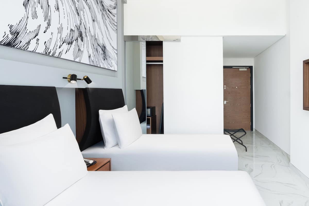 Standard Room, 2 Twin Beds | Minibar, in-room safe, blackout drapes, soundproofing