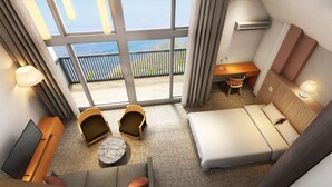 A hotel room with a large window, a bed, a desk, a chair, and a small round table. - SADO Futatsugame View Hotel (Sado)