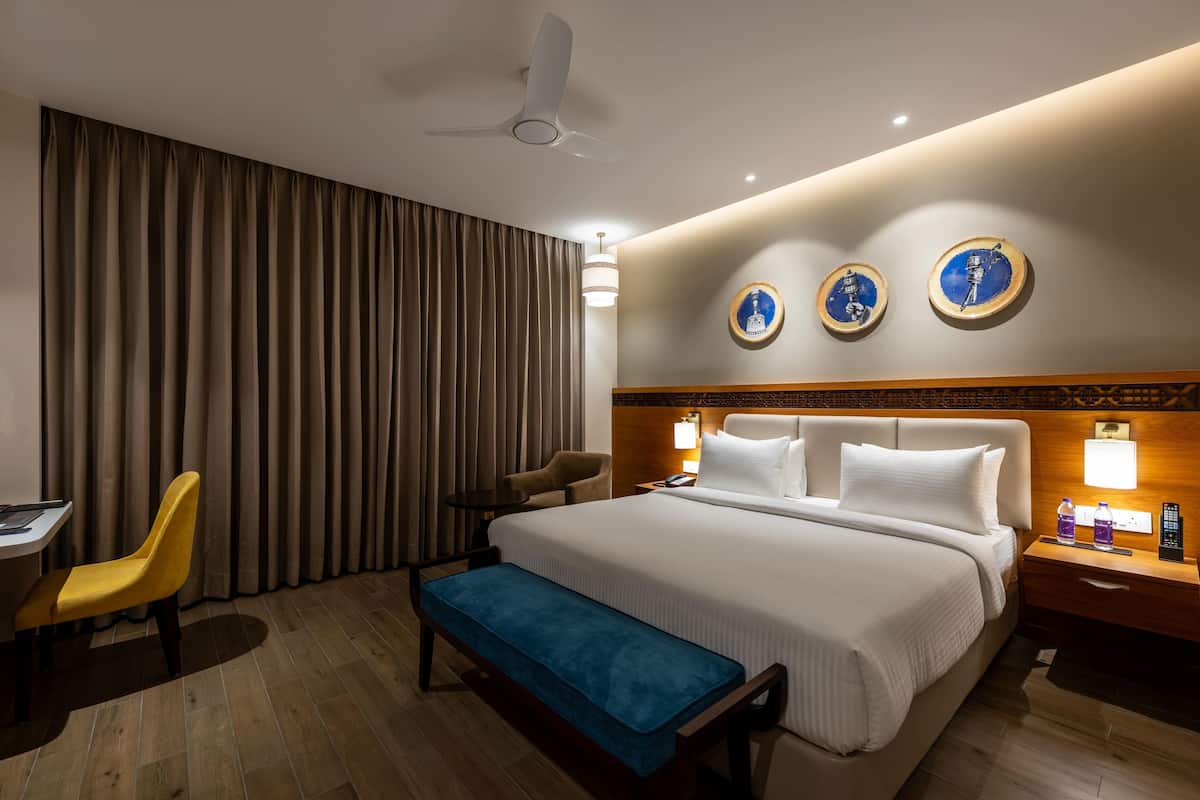 Egyptian cotton sheets, premium bedding, down duvets, minibar