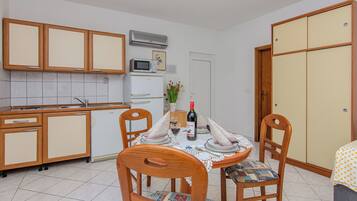 Standard Studio, Partial Sea View | Living area | 100-cm flat-screen TV with satellite channels