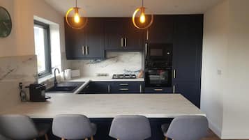 Cottage | Cuisine privée | Réfrigérateur, micro-ondes, four, plaque de cuisson