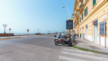 Stroll through the vibrant streets, lined with historic buildings and scenic views.