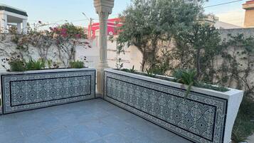 Family Villa, Garden View | Terrace/patio