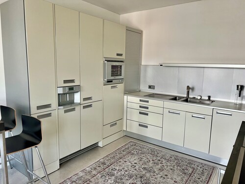 Villa with a balcony in the city center, elevator, luxury apartment on the Beletage