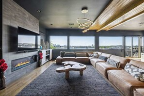 TV, fireplace, offices - Luxury Skyline Mansion: Pool, Hot Tub & Game Room! (Nashville)