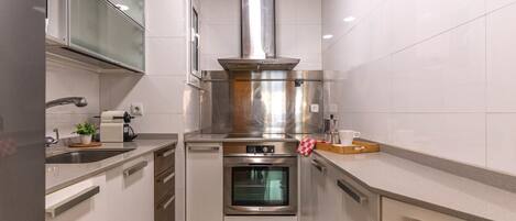 Fridge, microwave, dishwasher, coffee/tea maker