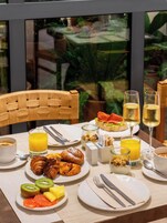 Daily buffet breakfast (EUR 18 per person)