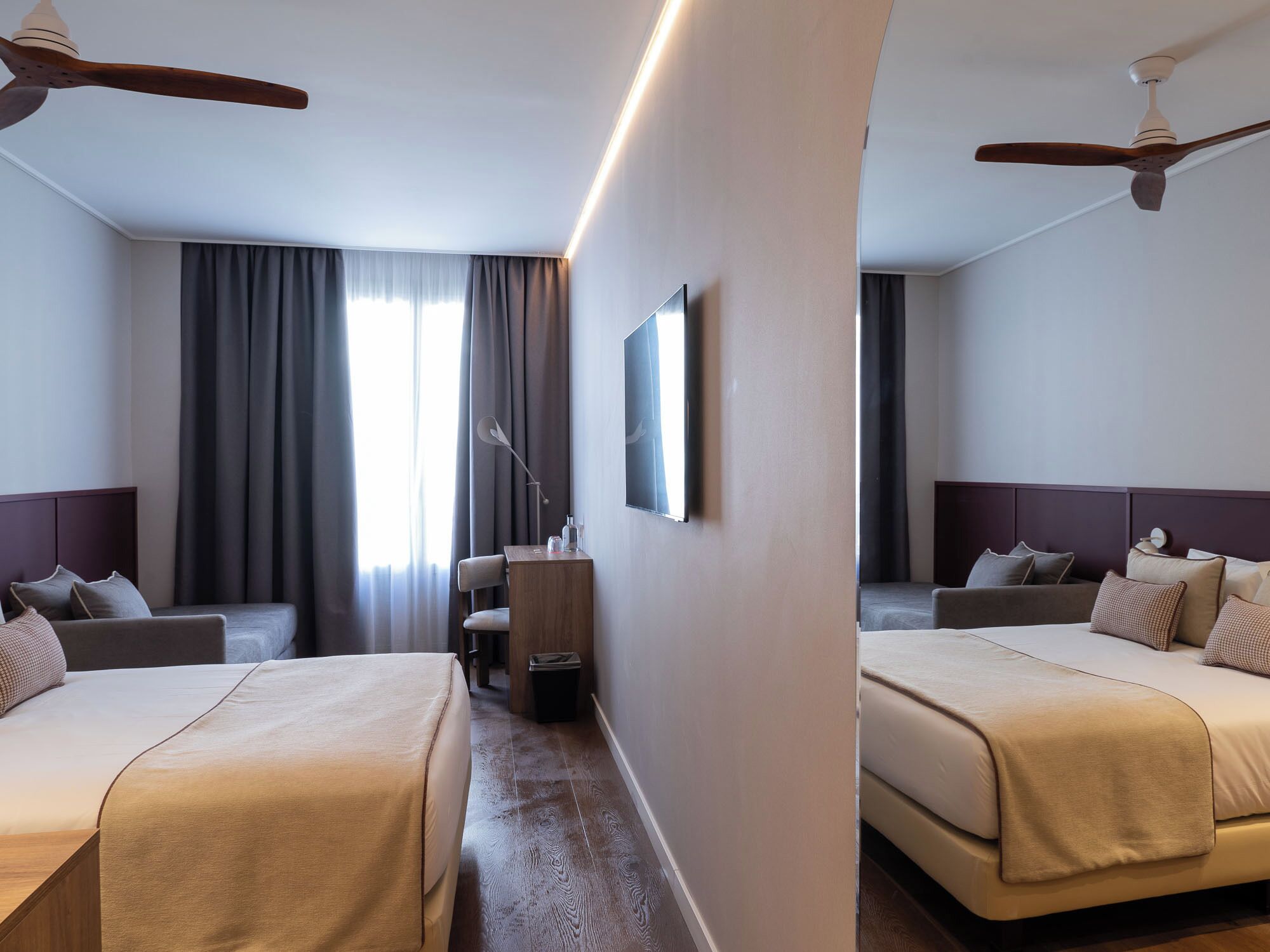 Deluxe kamer, 1 twee- of 2 eenpersoonsbedden, uitzicht op de stad | Lakens van Egyptisch katoen, luxe beddengoed, donsdekens, een minibar