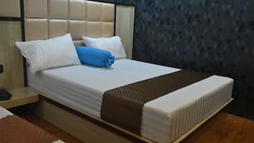 Suite | Memory-foam beds, bed sheets