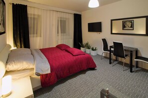 1 slaapkamer, een strijkplank/strijkijzer, wifi, beddengoed