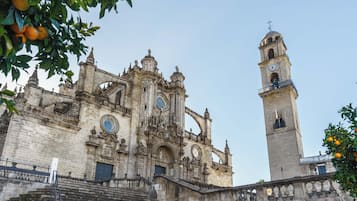 A historic cathedral with intricate architecture and a clock tower.