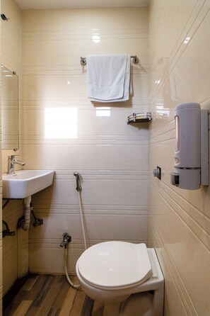 Shower, eco-friendly toiletries, towels, soap