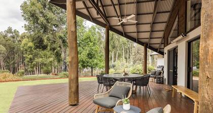 SERENE AND SECLUDED RURAL ESCAPE BOASTING PANORAMIC BUSHLAND VISTAS