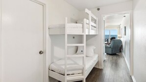 A bunk bed room with a view of the ocean. - Emerald Skye 51 by Liquid Life (Orange Beach)