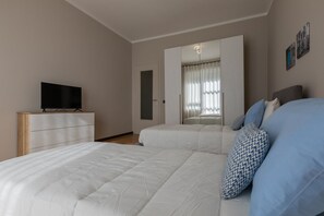 2 slaapkamers, een strijkplank/strijkijzer, gratis wifi, beddengoed