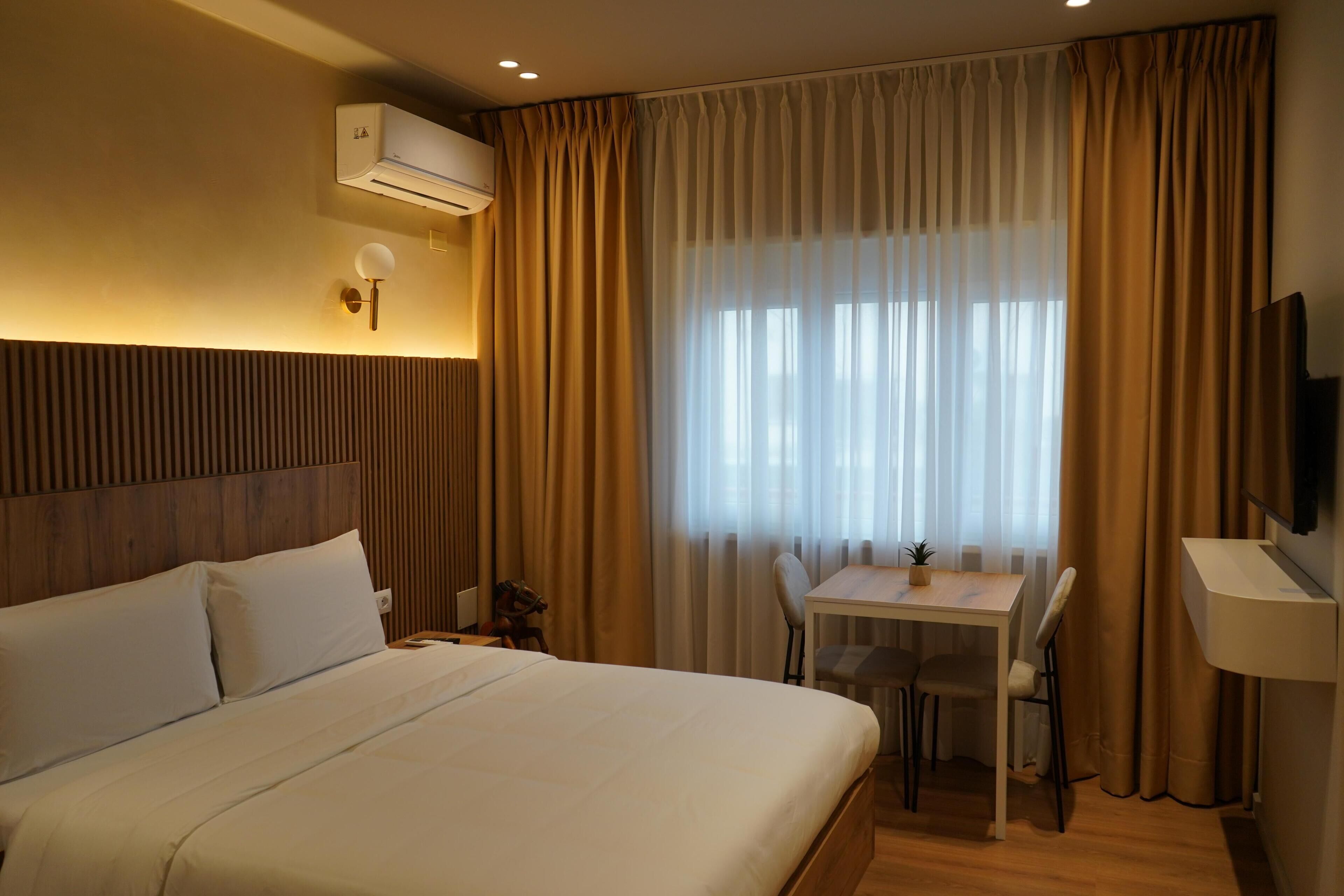 Standard Apartment 201, Non Smoking, Balcony | Hypo-allergenic bedding, blackout drapes, soundproofing