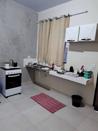 Fridge, stovetop, cookware/dishes/utensils, reusable coffee/tea filters. Uniting friends 1