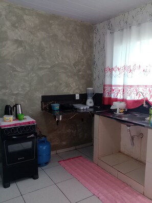 Fridge, stovetop, cookware/dishes/utensils, reusable coffee/tea filters