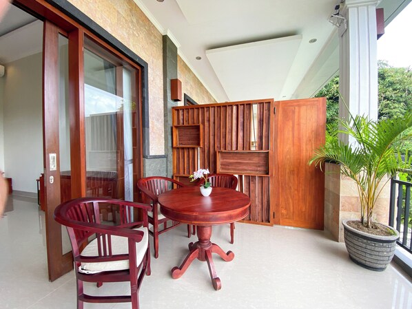 Appartement Deluxe, coin cuisine, vue jardin | Terrasse/Patio