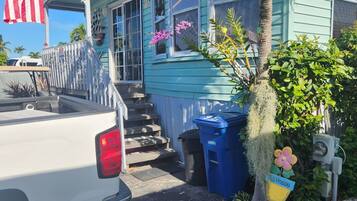 Enjoy a peaceful retreat in this charming home with a porch and garden area.