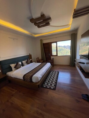 Premium bedding, down duvets, memory-foam beds, laptop workspace