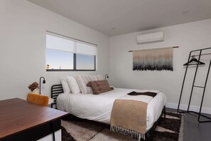 2 bedrooms, desk, iron/ironing board, travel crib