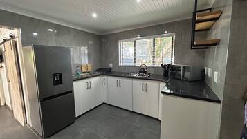 Fridge, microwave, stovetop, electric kettle
