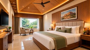 A modern hotel room with a large bed, a flat-screen TV, a seating area with a chair and table, and a large window with curtains. - deora resort and hotel (Jodhpur)