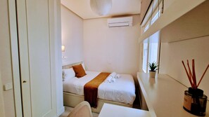 2 bedrooms, desk, iron/ironing board, travel cot